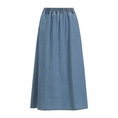 Blå denimunderdel med elastisk talje og A-line snit. Lang, svulmende nederdel i klassisk denim med rå kant forneden.