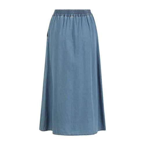 Blå denimunderdel med elastisk linning, A-formet snit og længde til anklen. Klassisk jeansstof i lys blå farve.